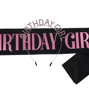 Close-up of pink rhinestone Birthday Girl headband and black satin sash set