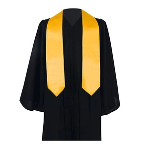 Detail view of a black graduation gown paired with a shiny bright yellow ceremonial stole