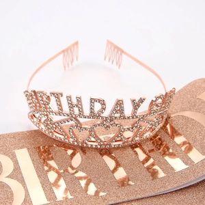 Detailed shot of rose gold Birthday Girl tiara with rhinestones and matching glitter sash