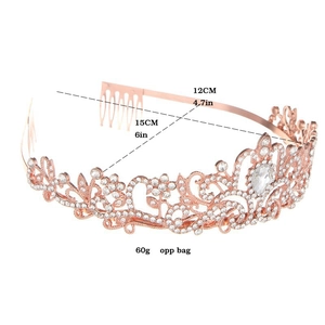 Detail of rose gold crystal tiara with side hair combs and teardrop center stone