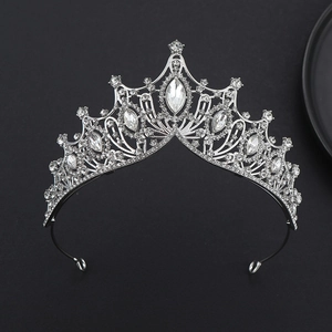 Macro detail of silver crystal crown featuring marquise and teardrop shaped gemstones