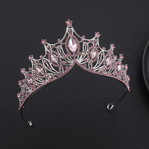Detail of silver bridal crown featuring pink rhinestones and marquise cut gems