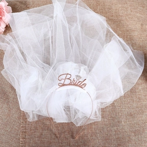 Elegant white bridal veil headband with rose gold Bride lettering on rustic linen background