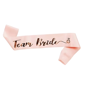 Pale pink satin Team Bride sash with rose gold foil lettering and diamond ring icon