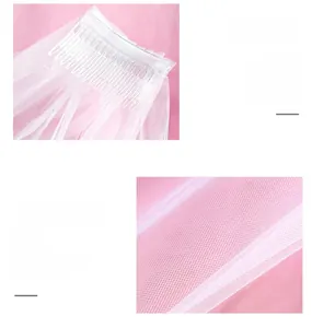 Detailed view of white bridal veil mesh texture and transparent plastic hair comb attachment
