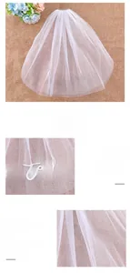 Detail of white bridal veil with elegant bride to be embroidery on soft mesh fabric