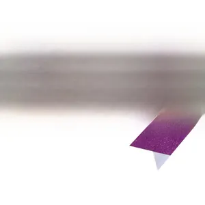 Detailed close-up of purple glitter sash material for parties and ceremonies