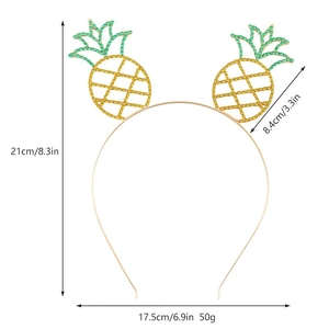 Detailed view of bohemian pineapple headband with sparkling green and yellow rhinestones
