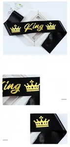 Dettaglio fascia King in raso nero con corona dorata per decorazioni da festa