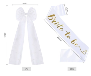 Detail view of white organza bridal bow and gold lettered sash with precise measurements