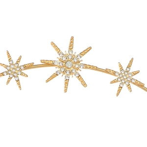 Detail of gold starburst headband featuring crystal octagonal stars and sun motifs