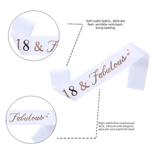 Detail of white satin sash with rose gold 18 and Fabulous lettering for birthday