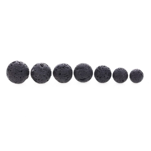 Macro view of black lava stone beads in gradient sizes for DIY essential oil bracelets