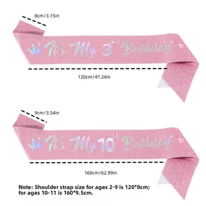 Confronto dimensioni di due fasce di compleanno rosa glitterate con scritte olografiche