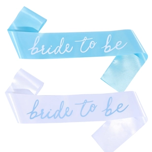 Close-up of sky blue and white satin Bride to be sashes for bachelorette party decor