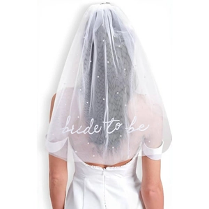 White bridal veil with pearl embroidery and Bride To Be lettering in an elegant back view
