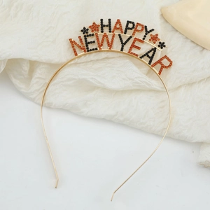 Χρυσή στέκα Happy New Year με πορτοκαλί και μαύρα κρύσταλλα για εορταστικές εκδηλώσεις