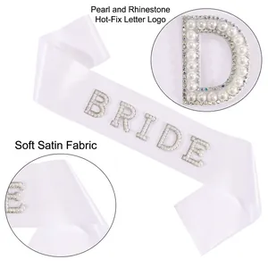 Elegant white satin Bride sash featuring pearl and rhinestone studded lettering for weddings