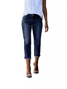 Women's vintage slim fit cropped denim jeans in dark blue wash with frayed hem details