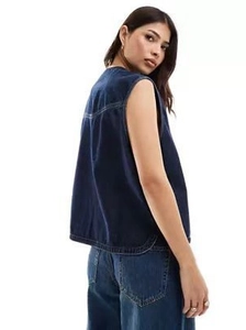 Women's sleeveless dark blue denim vest with contrast stitching and curved hemline