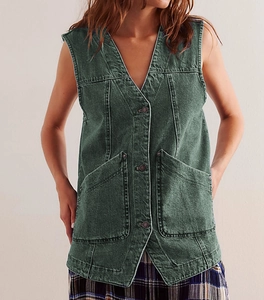 Detail of dark green denim vest showing V-neck design and three functional metal buttons