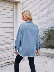 Women's vintage washed light blue denim jacket with frayed hem and drop shoulder style