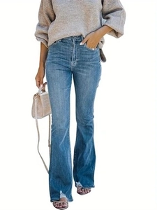 Women's high waist flared denim jeans with vintage wash and raw hem detail