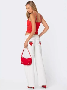 White wide-leg jeans with strawberry embroidery and red lace camisole top set