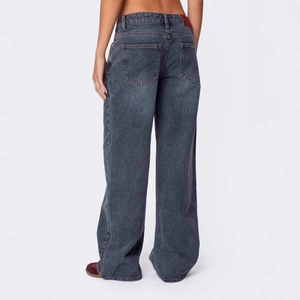 Detail view of baggy wide-leg jeans in vintage dark grey with classic back pockets
