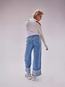 Retro washed light blue wide leg jeans with cuffed hem and stylish relaxed fit for women