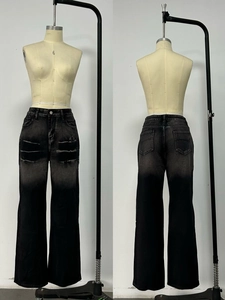 Front and back detail of vintage gradient distressed wide-leg jeans with ripped thighs