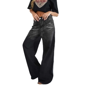 Detail of vintage high-waisted black wide-leg jeans with washed distressed finish
