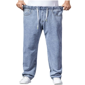 Detail view of light blue wide leg jeans for men with elastic drawstring waist