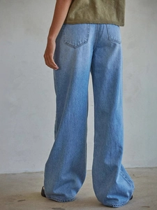 Women's light blue washed high waisted wide leg denim trousers with a relaxed fit