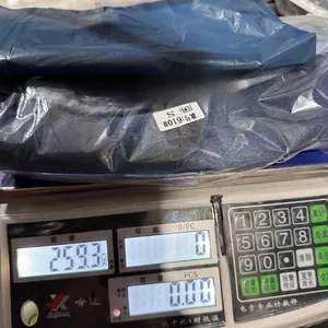 Macro shot of dark blue denim shorts in polybag on scales showing S size and 259g weight