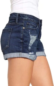 Detail view of high waisted distressed denim shorts with rolled hems in dark blue