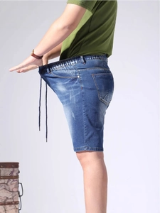 Men's blue stretch denim shorts with elastic drawstring waist and five-pocket design