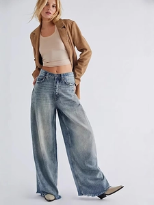 Pantalon en jean rétro à taille haute et jambe large avec bords francs effilochés stylés