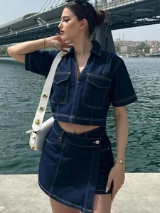 Navy blue denim two-piece set featuring cropped short sleeve top and high waist mini skirt