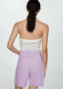 Back view detail of high waist striped shorts and halter backless top for women