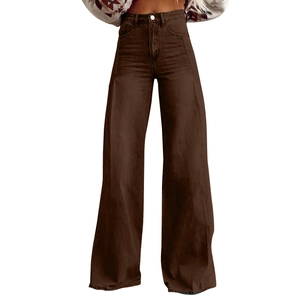 Detailed view of high waisted wide leg denim jeans in deep brown with metal button