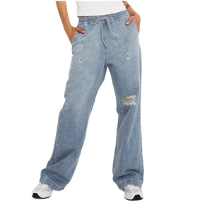 Detail of light blue ripped jeans showing distressed texture and drawstring waist