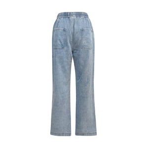 Detailed back view of light blue ripped jeans showing elastic waist and pockets