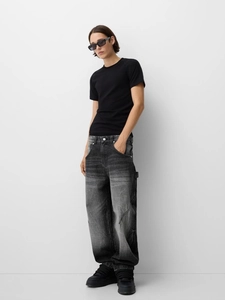 Men's fashion outfit featuring black slim T-shirt and vintage wash cargo denim jeans
