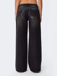 Jean large femme gris foncé avec délavage vintage et imprimés nœuds sur l'arrière