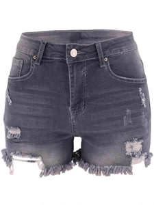 Detail showing distressed holes and frayed hem of high waist dark gray denim shorts