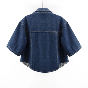 Back view of short-sleeved denim jacket in dark wash with classic yoke stitching details