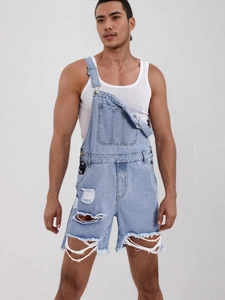 Salopette en jean bleu clair pour homme avec trous usés et design à ourlet frangé