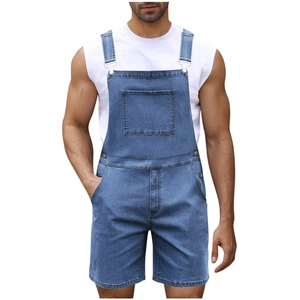 Detail of blue denim dungaree shorts with metal buckles and decorative chest pocket