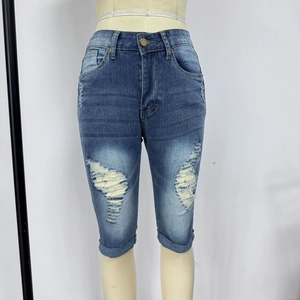 Pantalon Capri en jean slim taille haute bleu foncé avec détails déchirés